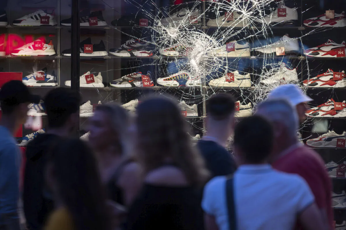 Attack on a window of a retail store in Stuttgart, Germany, on June 21, 2020. (Marijan Murat/dpa via AP)