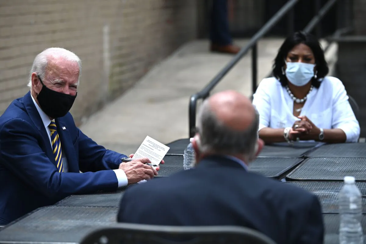 Democratic presidential candidate Joe Biden speaks about reopening the economy during a round table discussion at Carlettes Backyard Bar & Soul food Restaurant in Yeadon, Penn., on June 17, 2020. (Jim Watson/AFP via Getty Images)