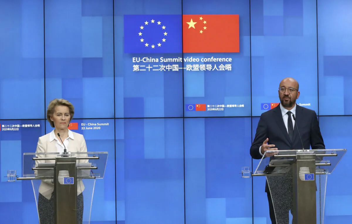 European Council President Charles Michel, right, and European Commission President Ursula von der Leyen participate in a media conference at the conclusion of an EU-China summit at the European Council in Brussels on June 22, 2020. (Yves Herman, Pool Photo via AP)