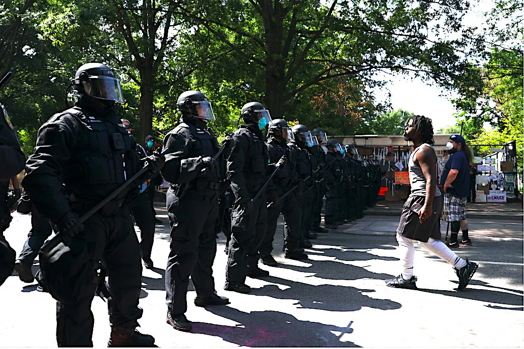 Police clear H street and Black Lives Matter Plaza after protesters set up an autonomous zone the previous night, just north of the White House in Washington on June 23, 2020. (Charlotte Cuthbertson/The Epoch Times)