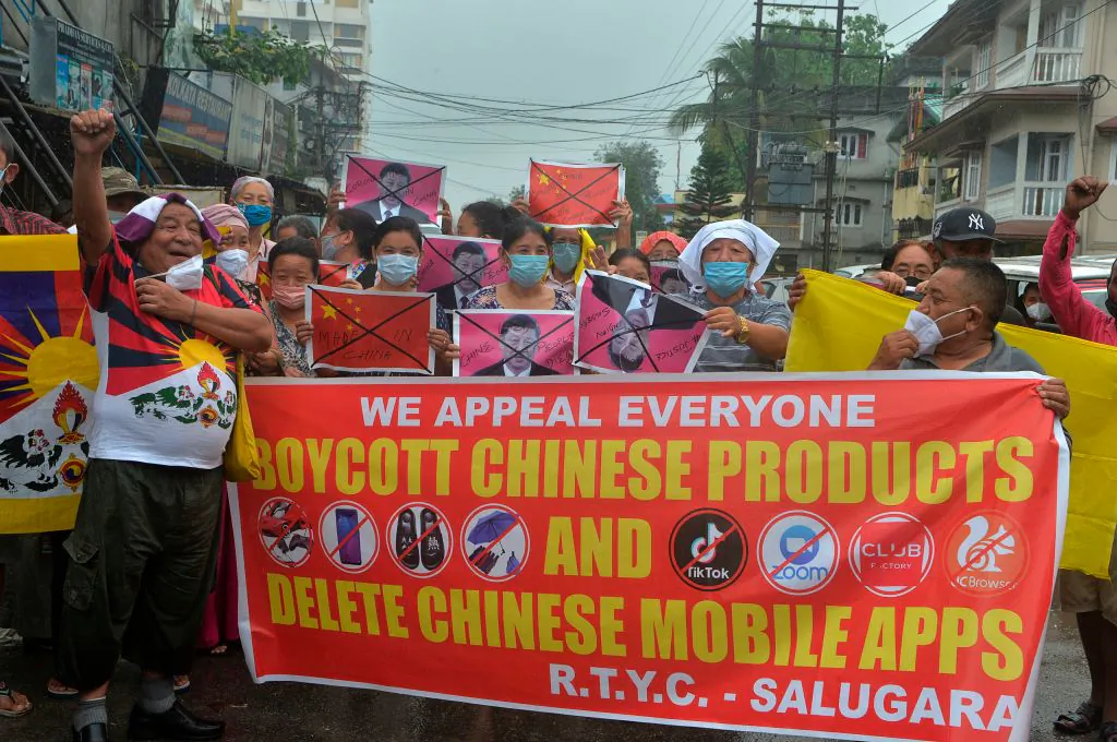 Indian activists along with Tibetans living in exile shout anti Chinese slogans during an anti-China demonstration in Siliguri on June 20, 2020. (Diptendu Dutta/AFP via Getty Images)