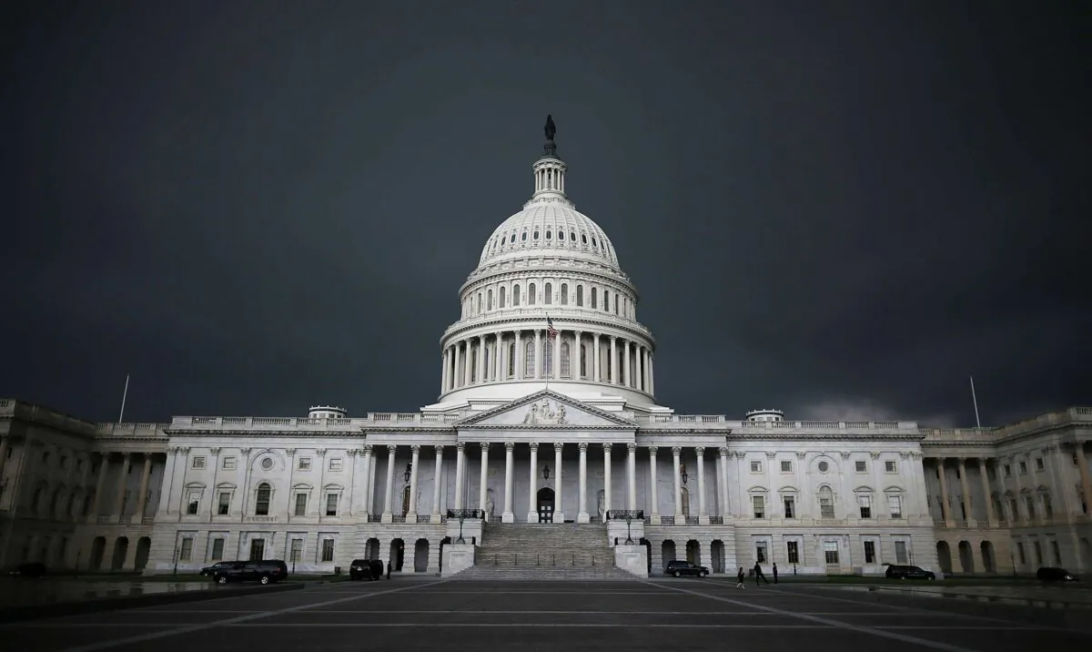 Storm clouds fill the sky over the U.S. Capitol Building in Washington on June 13, 2013. (Mark Wilson/Getty Images)