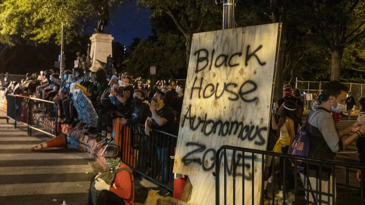 U.S. Park Police keep protesters away after they attempted to pull down the statue of Andrew Jackson in Lafayette Square near the White House in Washington on June 22, 2020. (Tasos Katopodis/Getty Images)