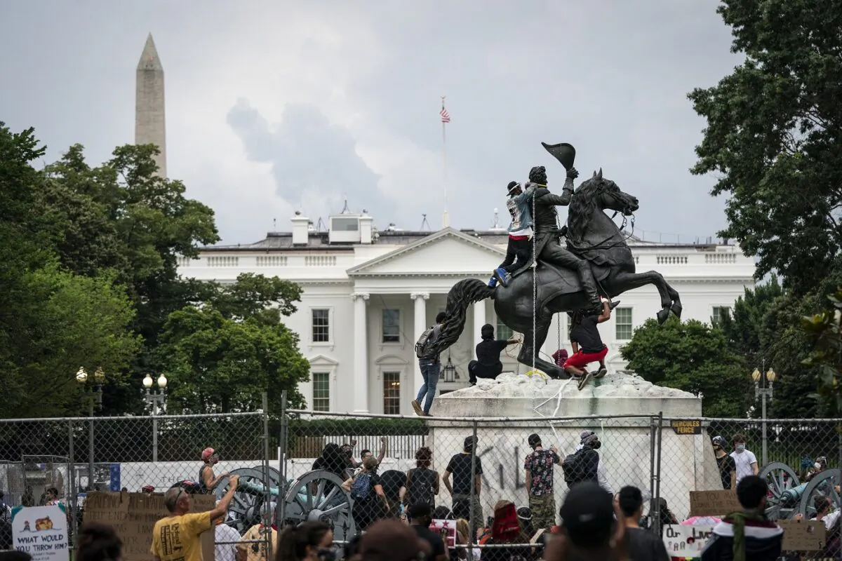 Protesters attempt to pull down the statue of Andrew Jackson in Lafayette Square near the White House on June 22, 2020. (Drew Angerer/Getty Images)