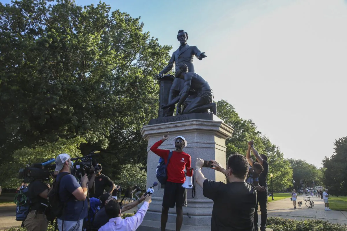 Protesters gather at Lincoln Park to demand the Emancipation Memorial be taken down in Washington on June 23, 2020. (Tasos Katopodis/Getty Images)