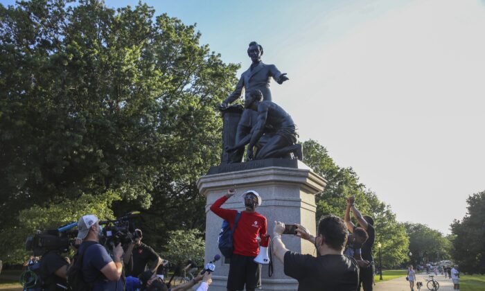 Protesters gather at Lincoln Park to demand the Emancipation Memorial be taken down in Washington on June 23, 2020. (Tasos Katopodis/Getty Images)
