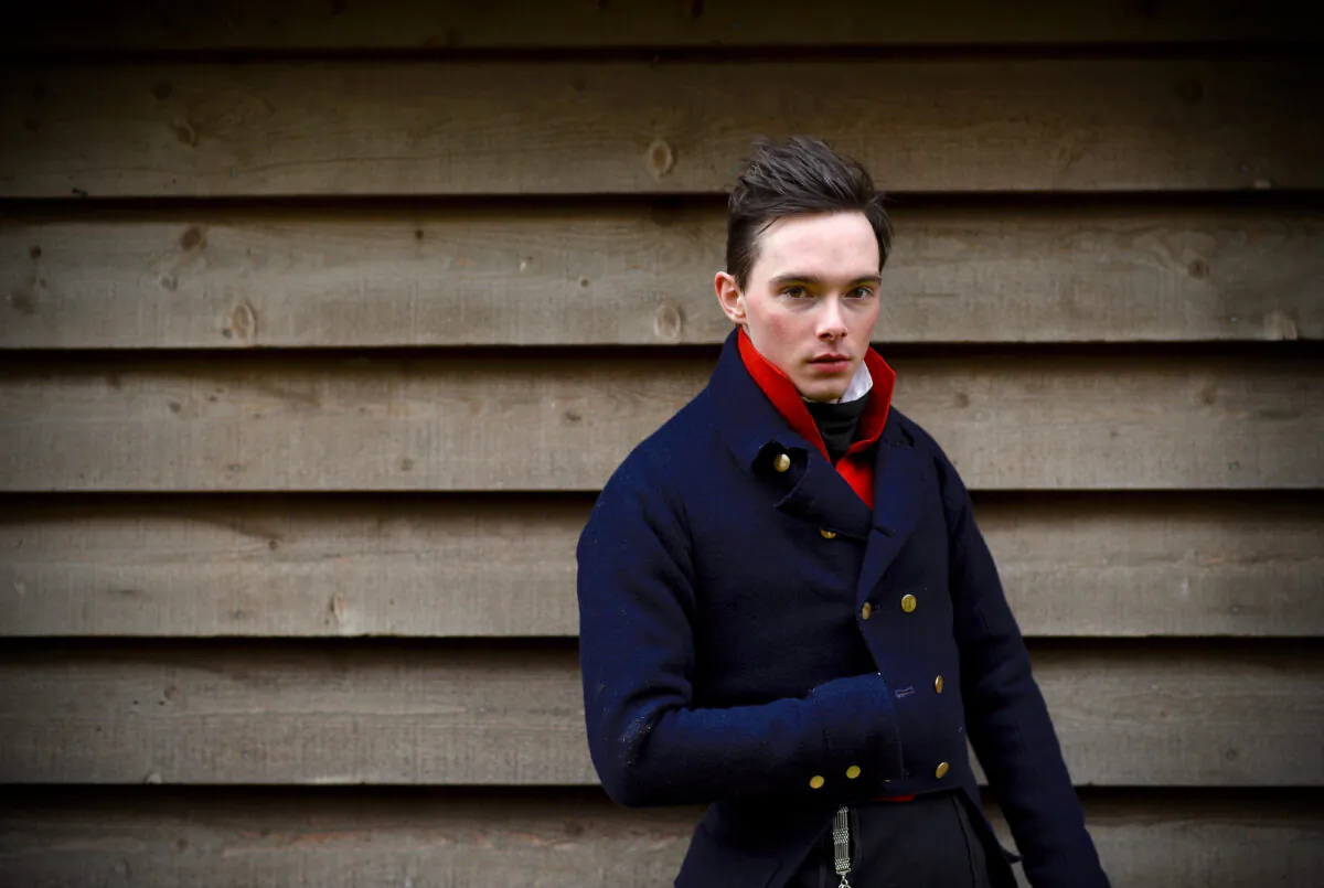 Wool tailcoat, pantaloons, and waistcoat with black silk cravat and watch fob. (Kathryn Griffiths)