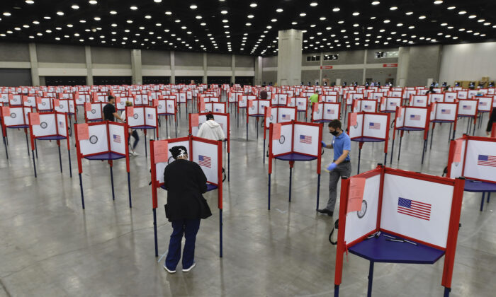 File photo showing voting stations in the Kentucky Exposition Center, in Louisville, Ky., on June 23, 2020. (Timothy D. Easley/AP Photo)