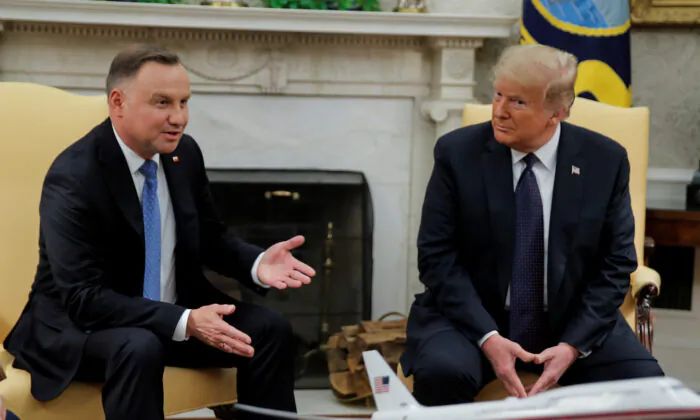 U.S. President Donald Trump listens to Poland's President Andrzej Duda during a meeting in the Oval Office at the White House in Washington, U.S., June 24, 2020. (Carlos Barria/Reuters)