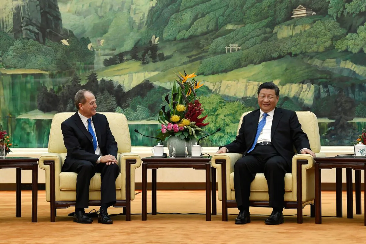 Chinese leader Xi Jinping meets with the 48 Group Club chairman Stephen Perry at the Great Hall of the People in Beijing on Oct. 16, 2018. (Daisuke Suzuki/AFP via Getty Images)