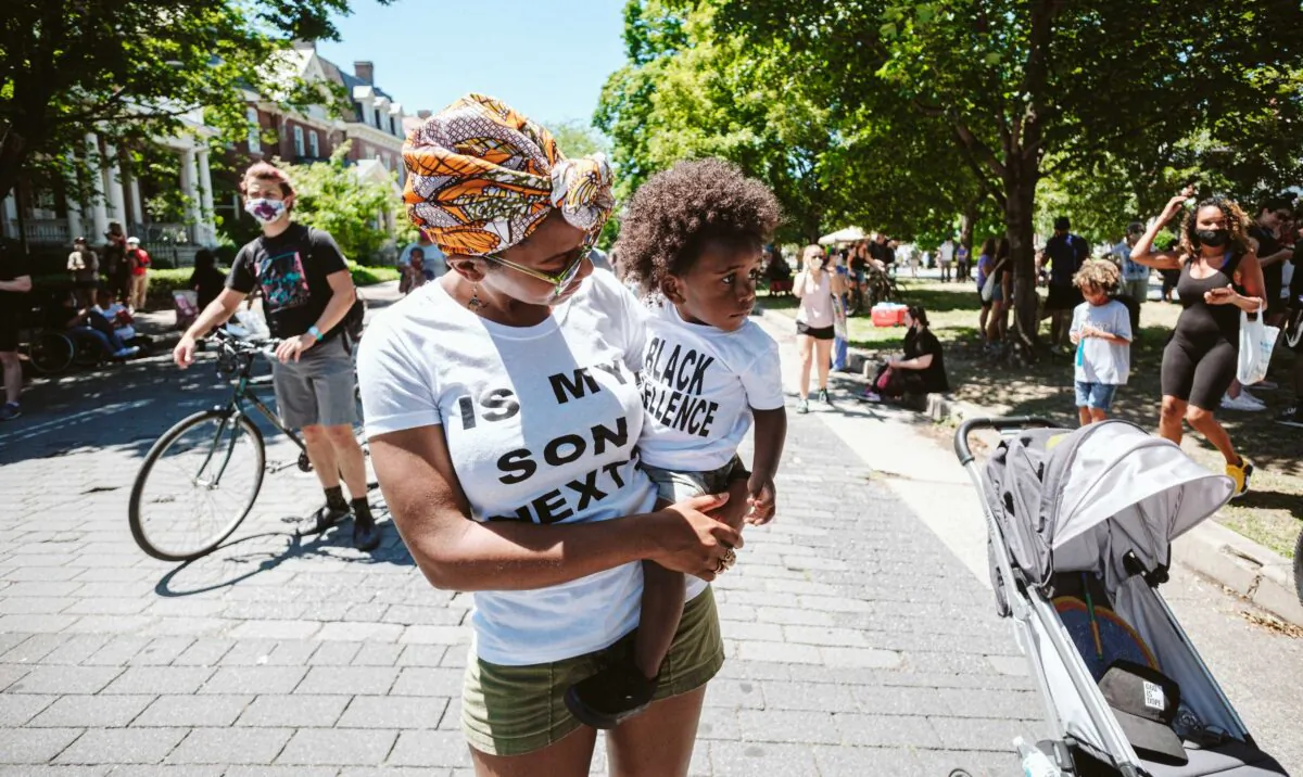 A mother and her son at the Richmond 5,000 Man March in Richmond, Va., on June 13, 2020. (Eze Amos/Getty Images)