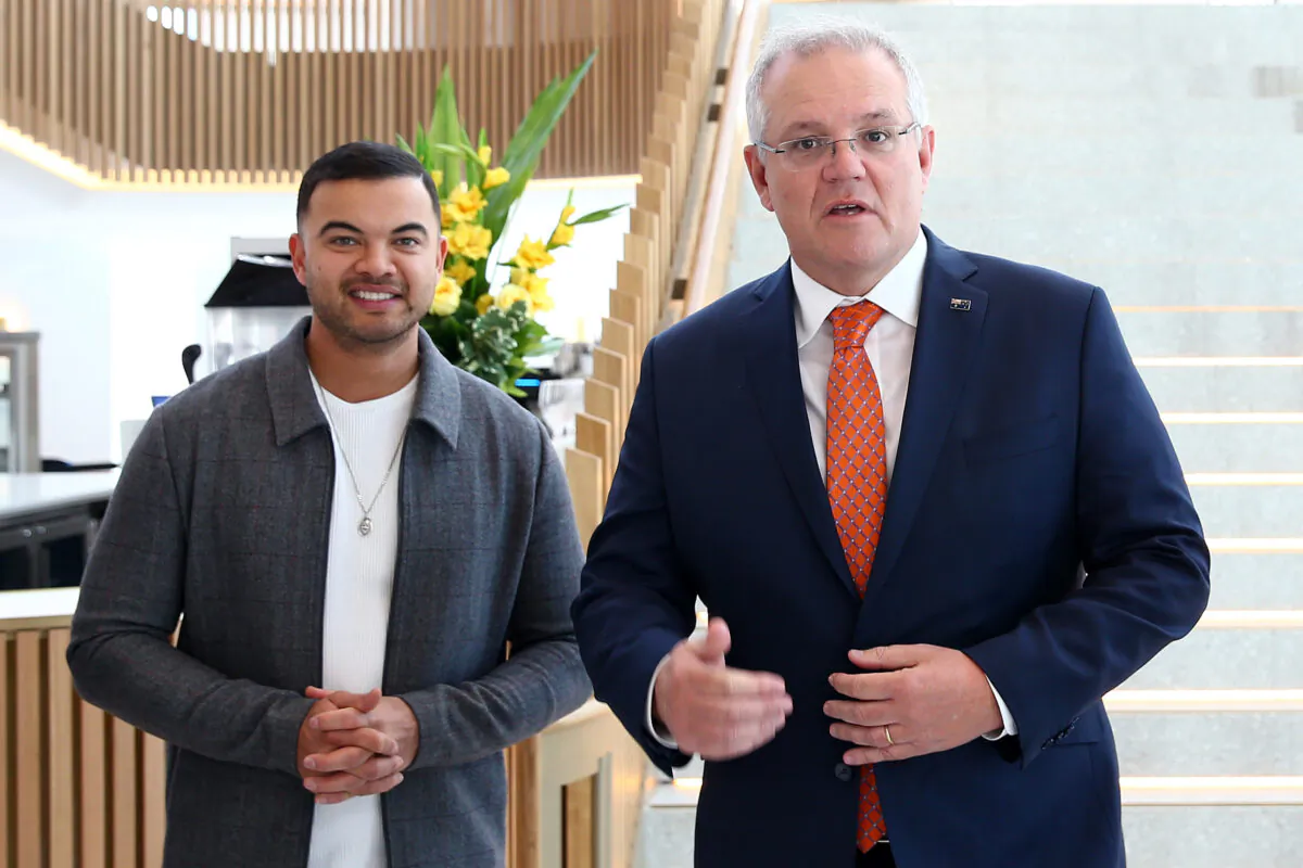 Guy Sebastian and Scott Morrison speak during a tour of the Sydney Coliseum Theatre at West HQ in Sydney, Australia, on June 25, 2020. (Matt Blyth/Getty Images)