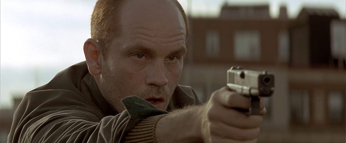 man with gun in "In the Line of Fire"