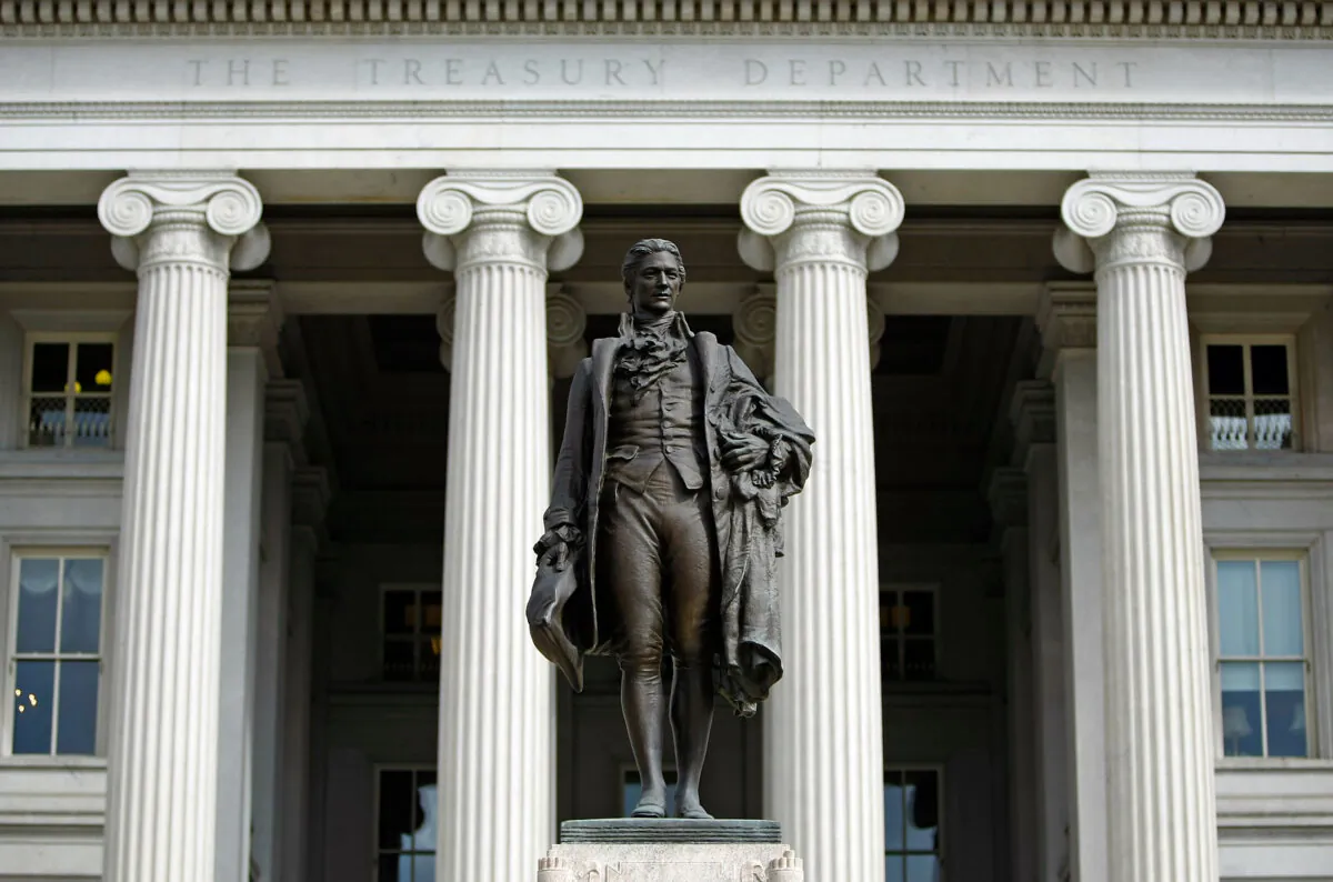 A statue of the first U.S. Secretary of the Treasury Alexander Hamilton stands in front of the Treasury building in Washington on Sept. 19, 2008. (Chip Somodevilla/Getty Images)