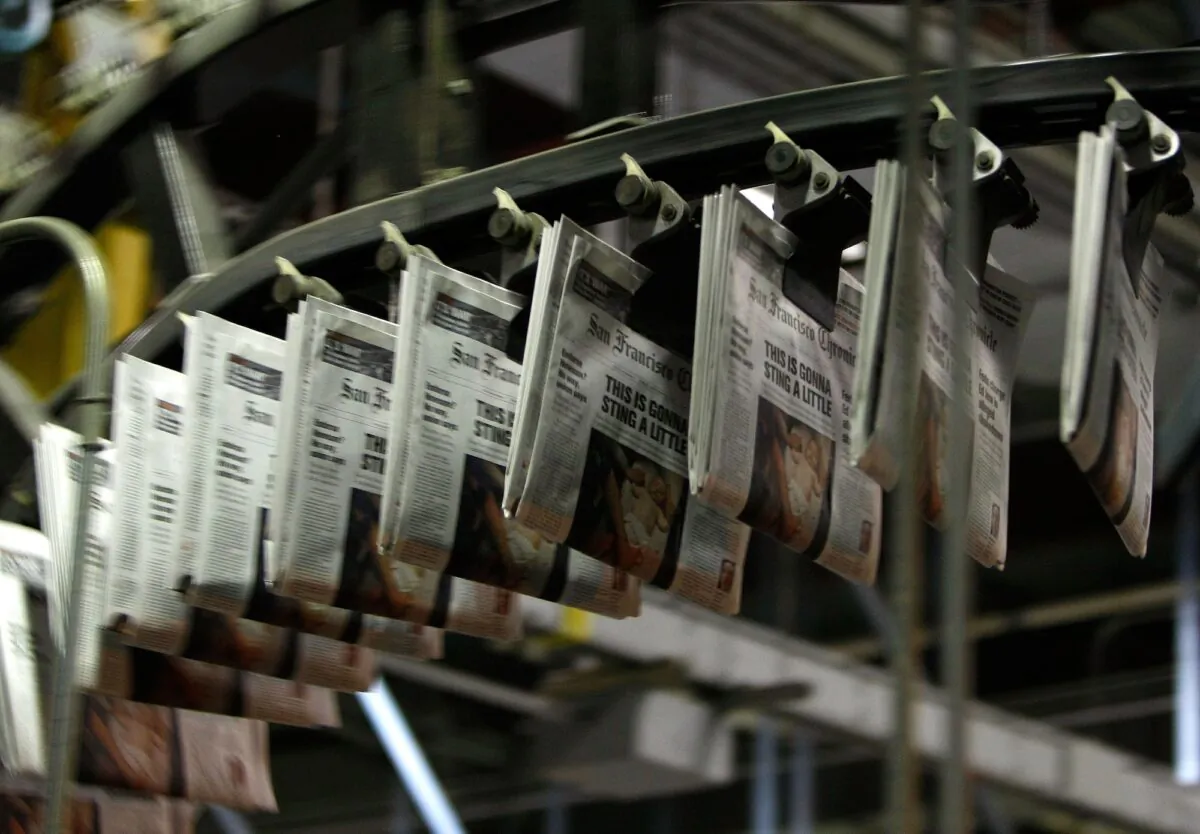 Freshly printed copies of the San Francisco Chronicle roll off the printing press at one of the Chronicle's printing facilities in San Francisco on Sept. 20, 2007. (Justin Sullivan/Getty Images)