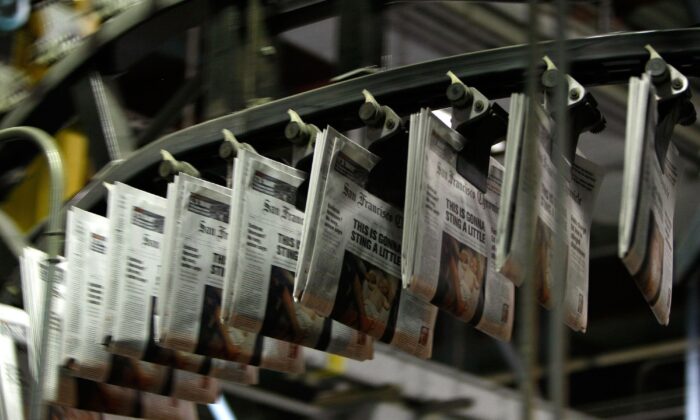Freshly printed copies of the San Francisco Chronicle roll off the printing press at one of the Chronicle's printing facilities in San Francisco on Sept. 20, 2007. (Justin Sullivan/Getty Images)