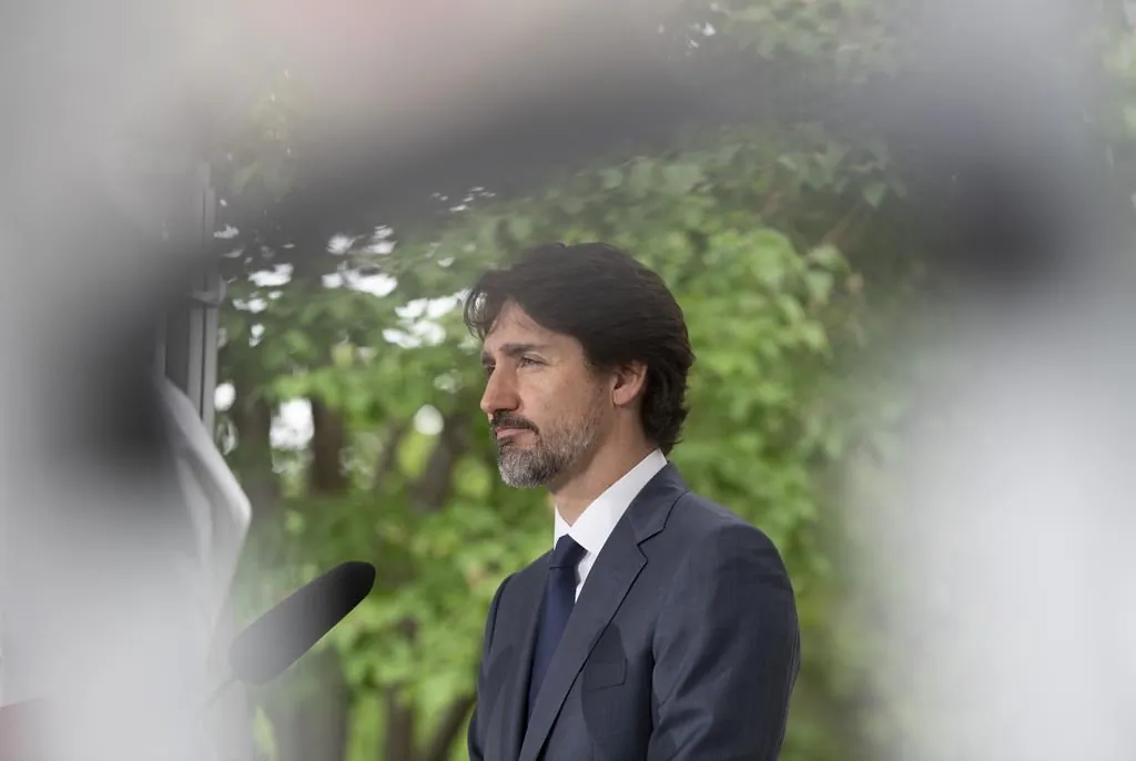 Prime Minister Justin Trudeau responds to a question during a news conference outside Rideau Cottage in Ottawa, on June 25, 2020. (The Canadian Press/Adrian Wyld)