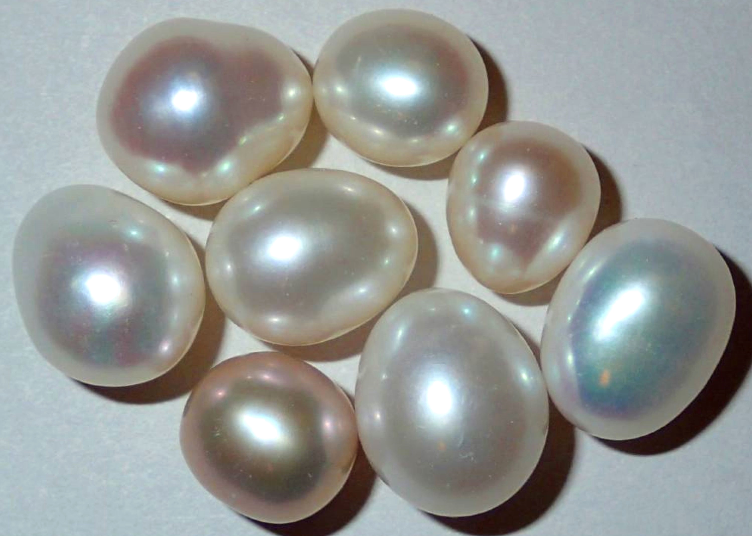 are cultured pearls real