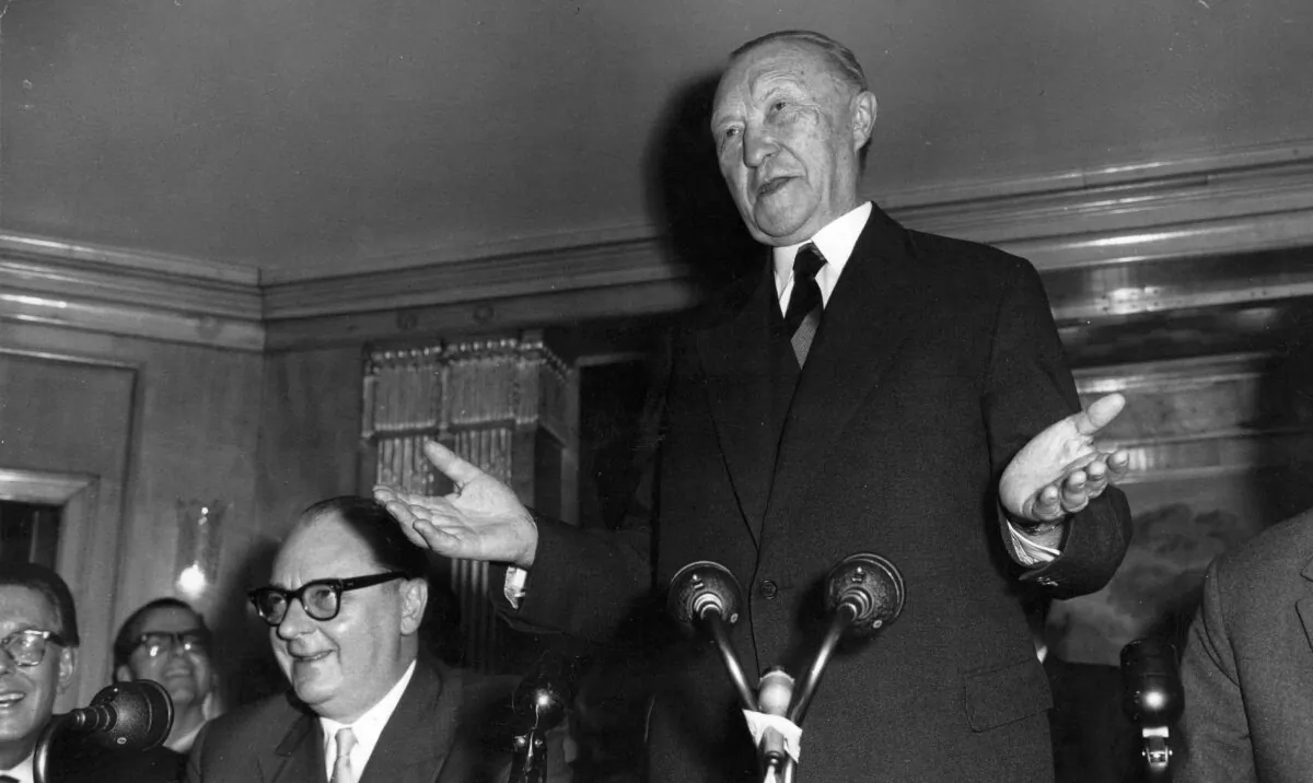 German Chancellor Dr. Konrad Adenauer speaks at a press conference at the Dorchester Hotel, London, on Jan. 1, 1959. (Keystone/Getty Images)