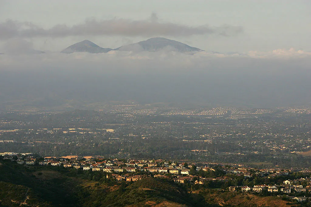 Urban sprawl that has filled most of Orange County spreads out in front of a ridge in Laguna Coast Wilderness Park south of Irvine, Calif., on April 23, 2008. (David McNew/Getty Images)