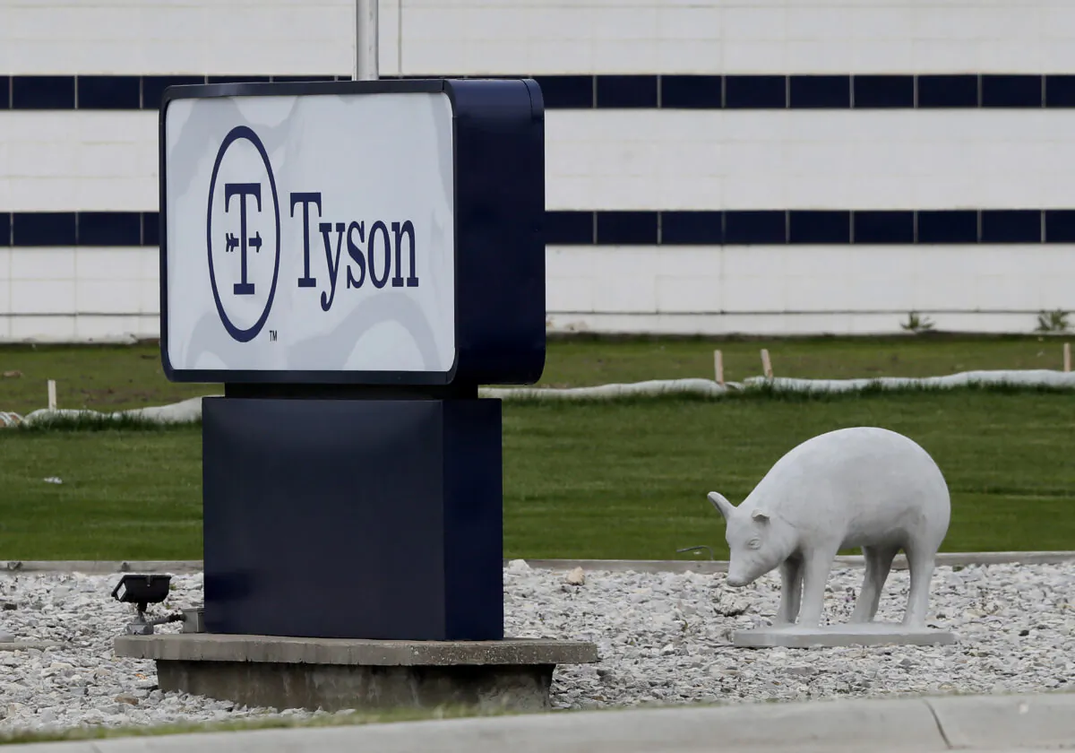 A sign sits in front of the Tyson Foods plant in Waterloo, Iowa, on May 1, 2020. (Charlie Neibergall/File Photo/AP Photo)