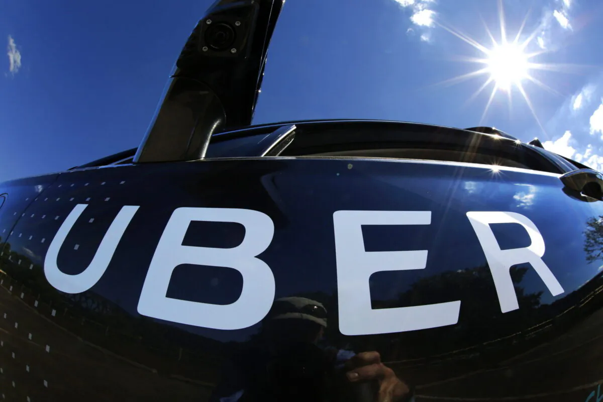 A self-driving Uber sits ready to take journalists for a ride during a media preview in Pittsburgh, on Sept. 12, 2016. (Gene J. Puskar/The Canadian Press-AP)
