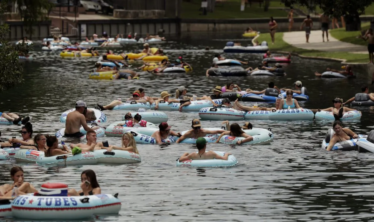 Tubers float the Comal River despite the recent spike in COVID-19 cases  in New Braunfels, Texas, on June 25, 2020. (Eric Gay/AP Photo)