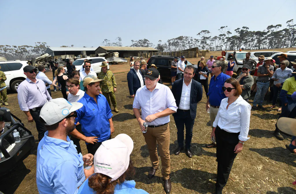 Australian Prime Minister Scott Morrison is seen with South Australian Premier Steven Marshall and Senator Anne Ruston during a visit to a fire damaged property on Stokes Bay on Kangaroo Island, southwest of Adelaide, Wednesday, January 8, 2020.(David Mariuz-Pool via Getty Images)