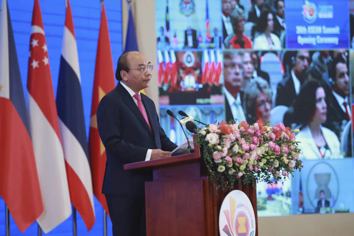 Vietnamese Prime Minister Nguyen Xuan Phuc delivers a speech at the opening ceremony of the 36th ASEAN Summit in Hanoi, Vietnam, on June 26, 2020. (Hau Dinh/AP Photo)