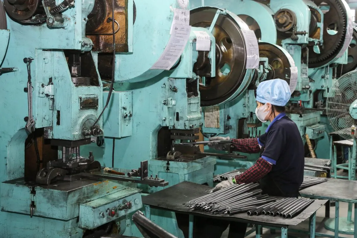 An employee working at a factory in Haian in China's eastern Jiangsu Province, China, on June 9, 2020. (STR/AFP via Getty Images)