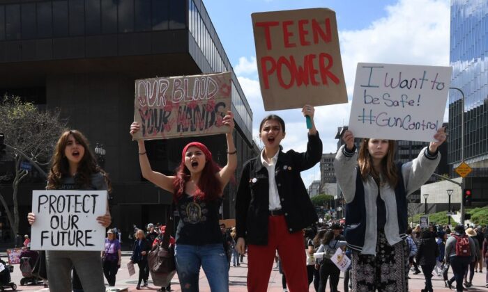 Teenagers protest against gun laws during the student-organized March for Our Lives rally in Los Angeles, Calif., on March 24, 2018. (Mark Ralston/AFP via Getty Images)