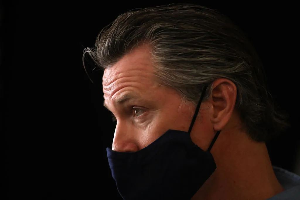 California Gov. Gavin Newsom is interviewed while visiting the Hot and Cool Cafe in Los Angeles, on June 3, 2020. (Genaro Molina/POOL/AFP via Getty Images)