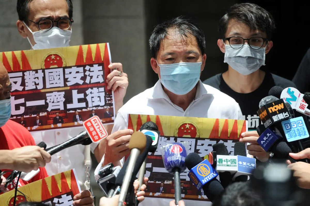 (L-R) Andy Chui, Wu Chai-wai, and Figo Chan speak to the press in Hong Kong on June 30, 2020. (Song Bilung/The Epoch Times)