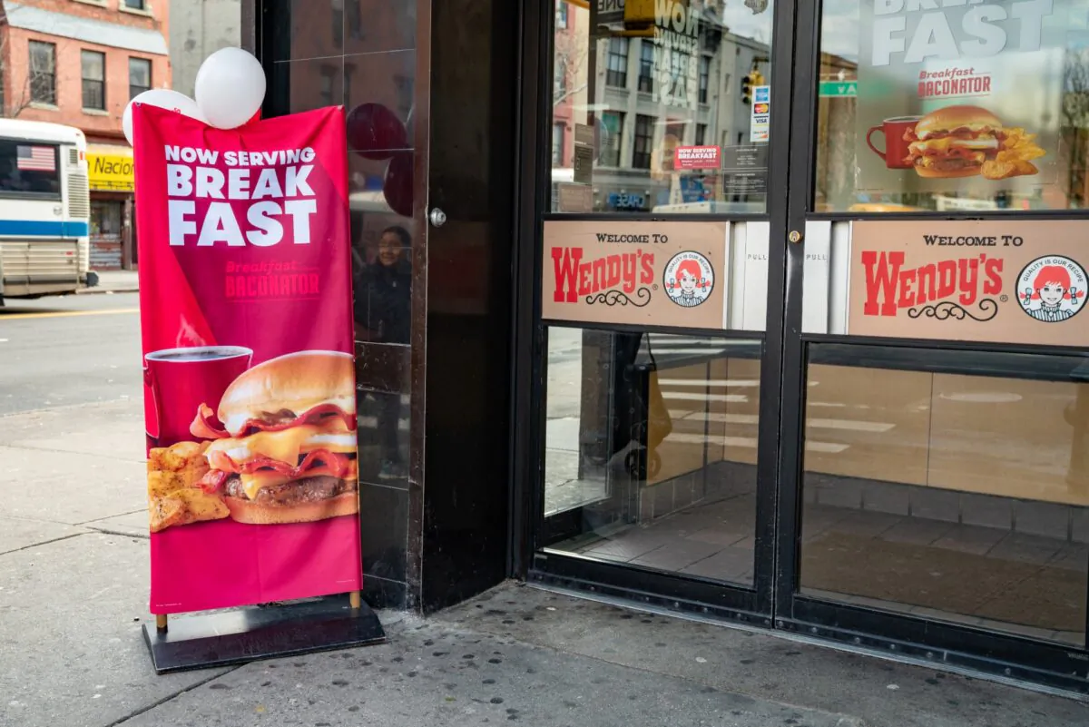 A banner announcing 'Now Serving Breakfast' is shown outside a Wendy's restaurant in New York City, on March 2, 2020. (David Dee Delgado/Getty Images)