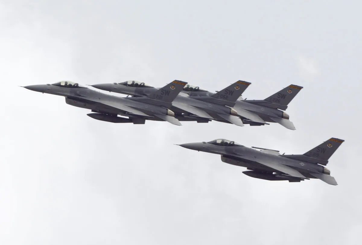 Four F-16's from the 79th Fighter Squadron at Shaw Air Force Base fly over during pre race ceremonies at the NASCAR Winston Cup Series Daytona 500 at the Daytona International Speedway in Daytona Beach, Fla., on Feb. 16, 2003. (Robert Laberge/Getty Images)
