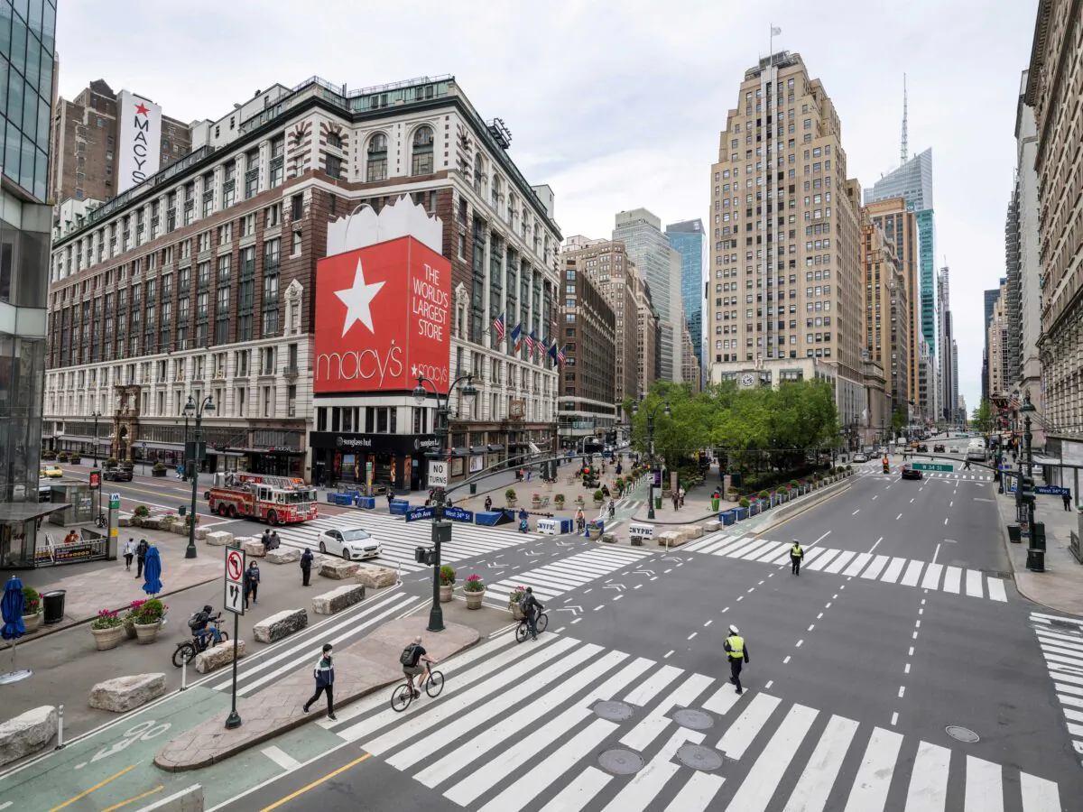 A firetruck drives down 34th street past a closed Macy’s and Herald Square as streets remain less busy due to the continuing outbreak of the COVID-19 in New York City, on May 5, 2020. (Lucas Jackson/Reuters)