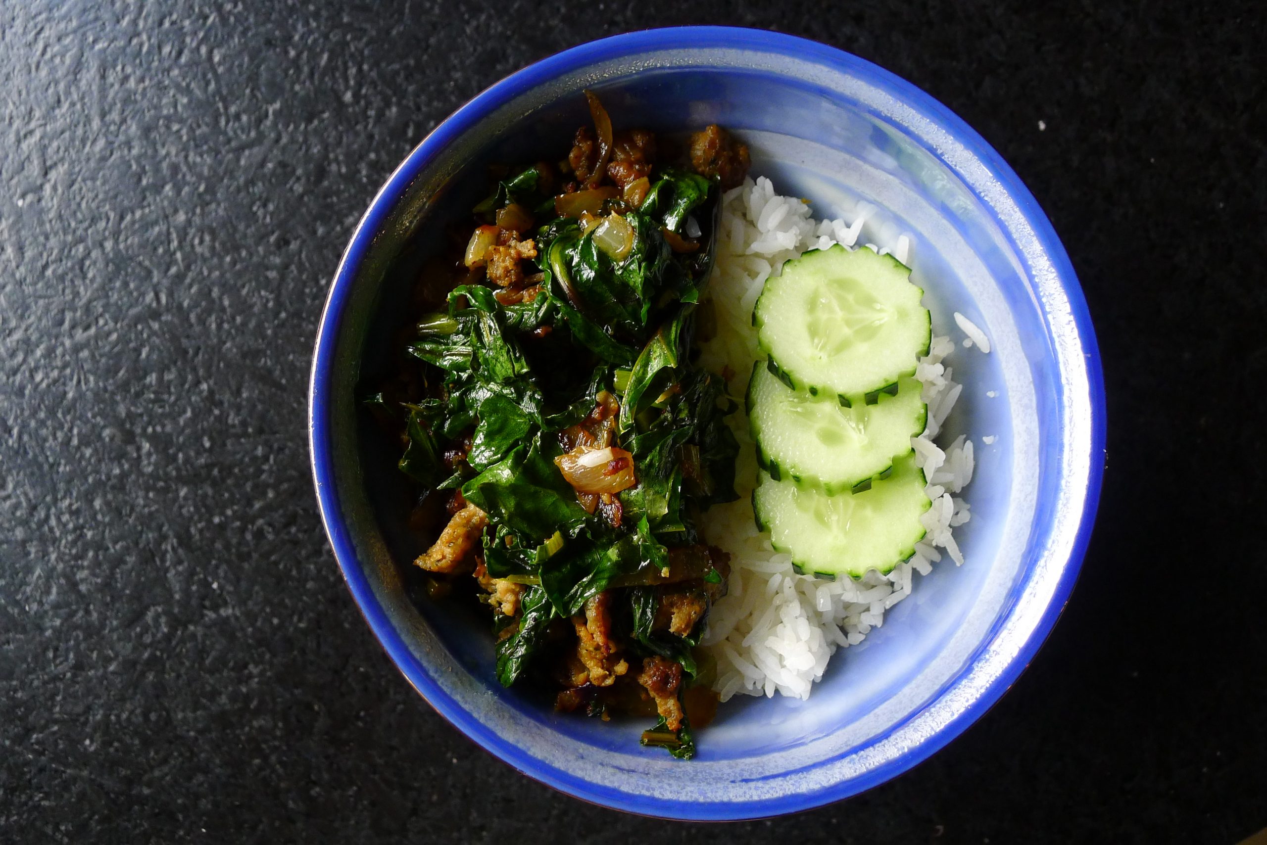beet greens and sausage over rice