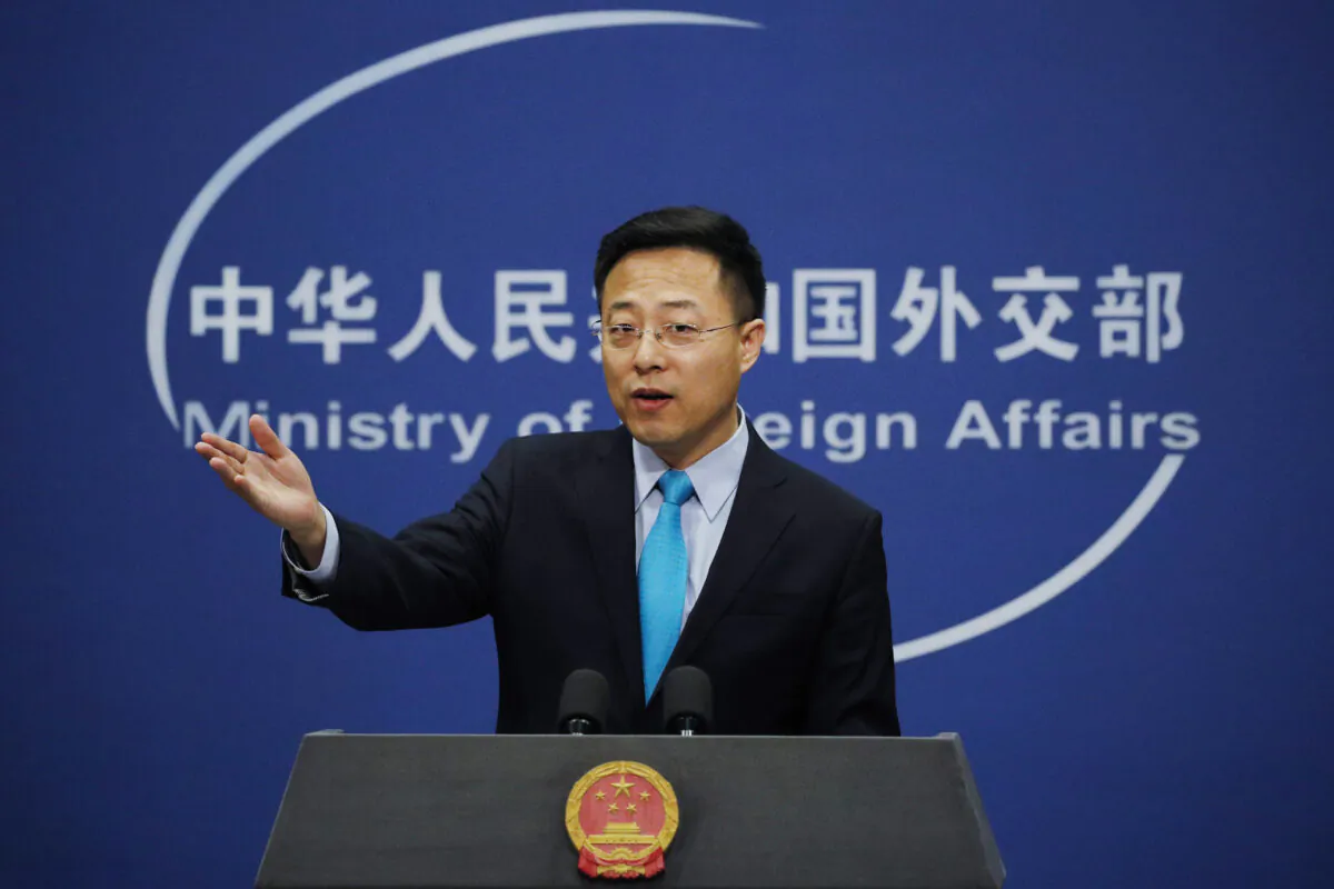 Chinese Foreign Ministry new spokesman Zhao Lijian speaks during a daily briefing at the Ministry of Foreign Affairs office in Beijing on Feb. 24, 2020. (Andy Wong/AP Photo)