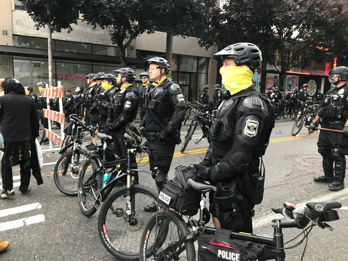 Seattle police block a street with their bikes in the Capitol Hill Organized Protest zone in Seattle on July 1, 2020. (Aron Ranen/AP Photo)