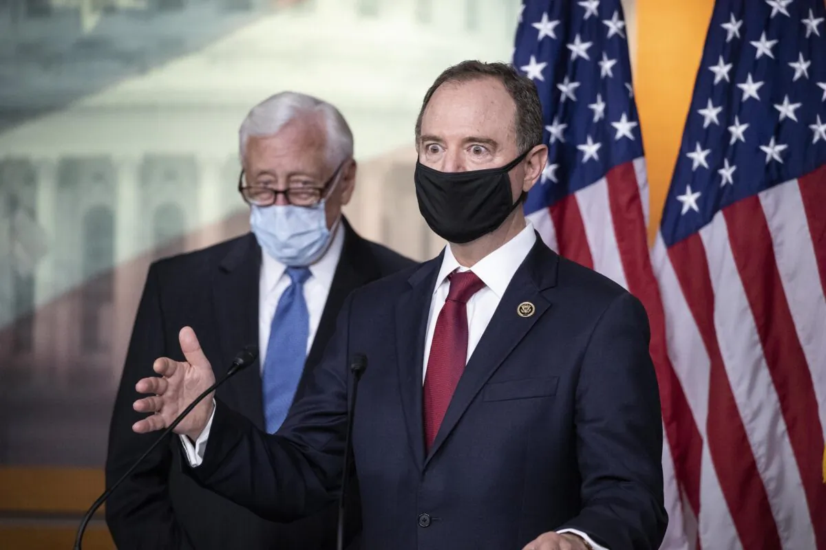 Rep. Adam Schiff (D-Calif.), chairman of the House Intelligence Committee, right, speaks accompanied by House Majority Leader Steny Hoyer (D-Md.), during a news conference on Capitol Hill, after a meeting at the White House in Washington on June 30, 2020. (Alex Brandon/AP Photo)