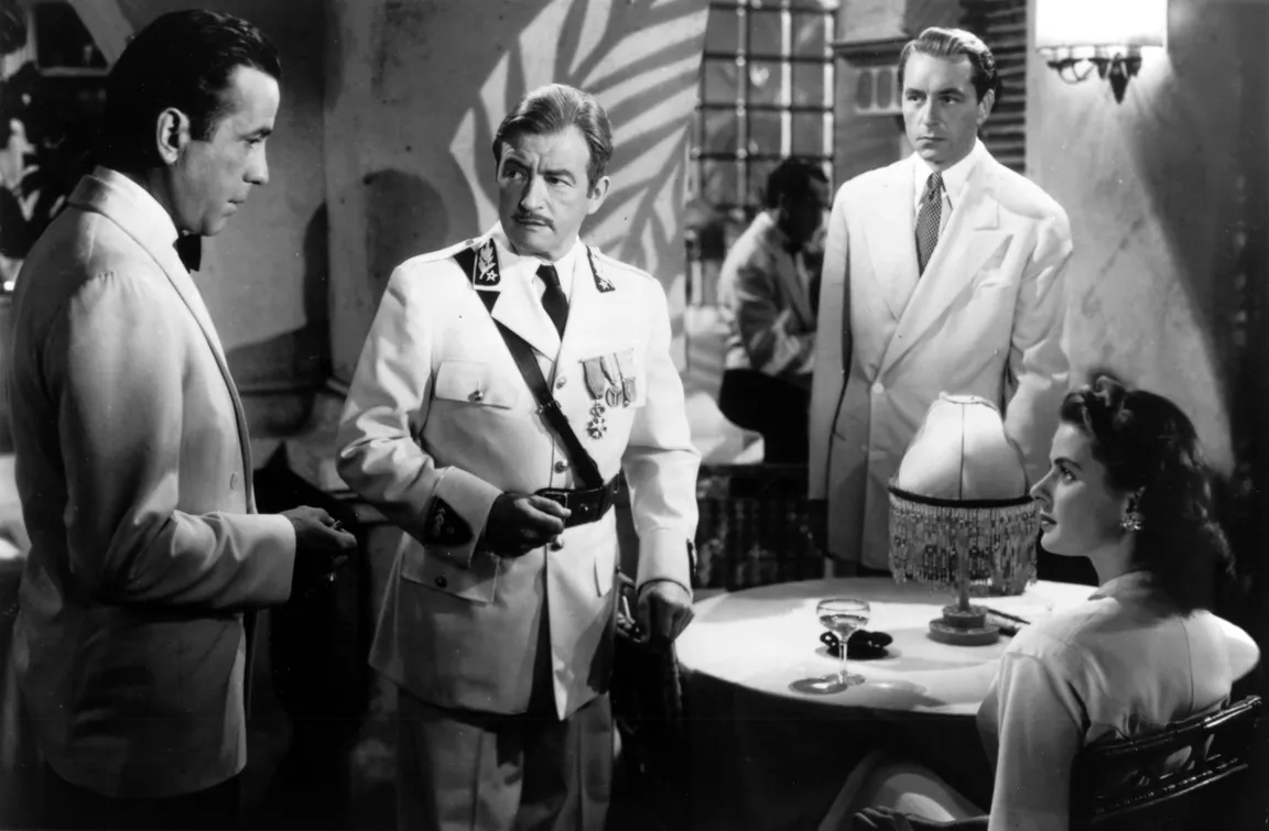(L–R) Rick (Humphrey Bogart), and Ilse (Ingrid Bergman) in "Casablanca." (Warner Bros.)