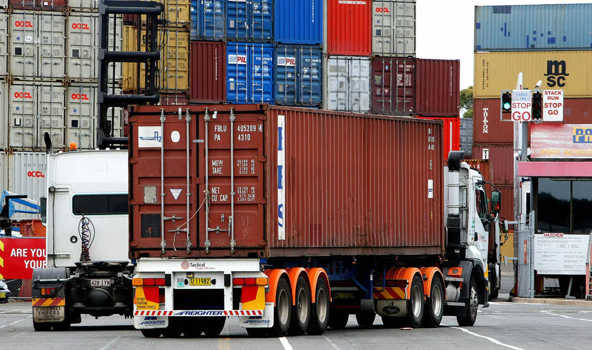 Container trucks arrive at Port Botany's maritime dock near Sydney on November 26, 2008. (GREG WOOD/Getty Images)