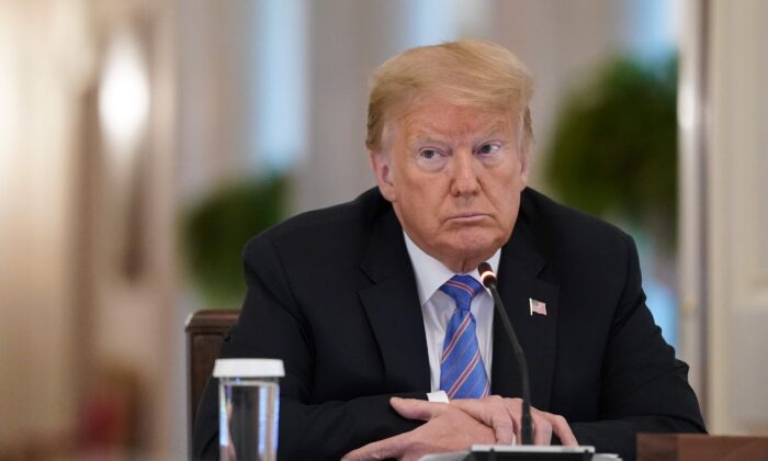 President Donald Trump participates in a meeting of the American Workforce Policy Advisory Board in the East Room of the White House in Washington on June 26, 2020. (Drew Angerer/Getty Images)