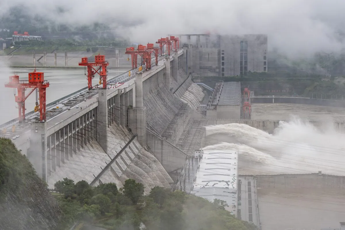 The Three Gorges Dam, a gigantic hydropower project on the Yangtze River, discharges flood waters in Yichang, central China's Hubei Province on June 29, 2020. (STR/AFP via Getty Images)