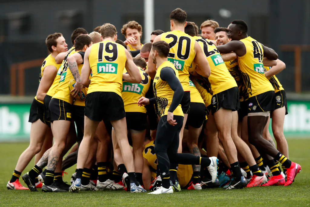 Richmond players huddle during a Richmond Tigers AFL training session at Punt Road Oval on July 03, 2020 in Melbourne, Australia. ( Darrian Traynor/Getty Images)