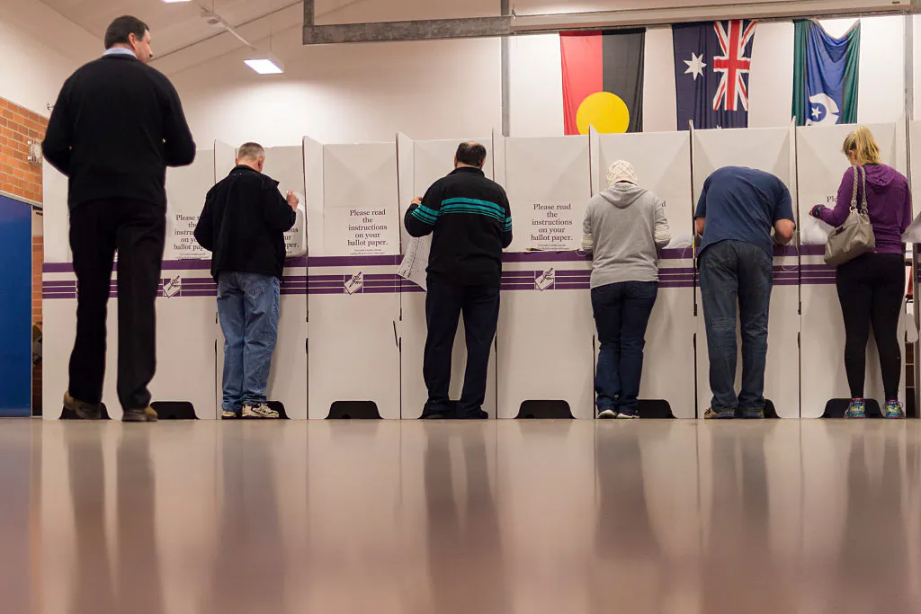Federal Labor's candidate for Eden Monaro Mike Kelly (far left) votes in the electorate of Eden-Monaro on July 2, 2016 in Canberra, Australia. (Martin Ollman/Getty Images)