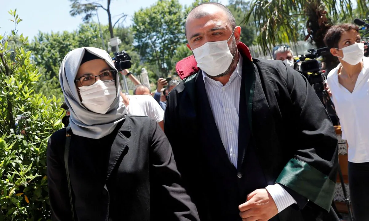 Hatice Cengiz, a fiancee of the murdered Saudi journalist Jamal Khashoggi, leaves the Justice Palace after attending a trial on the killing of Khashoggi at the Saudi Arabian Consulate, in Istanbul, Turkey, on July 3, 2020. (Murad Sezer/Reuters)