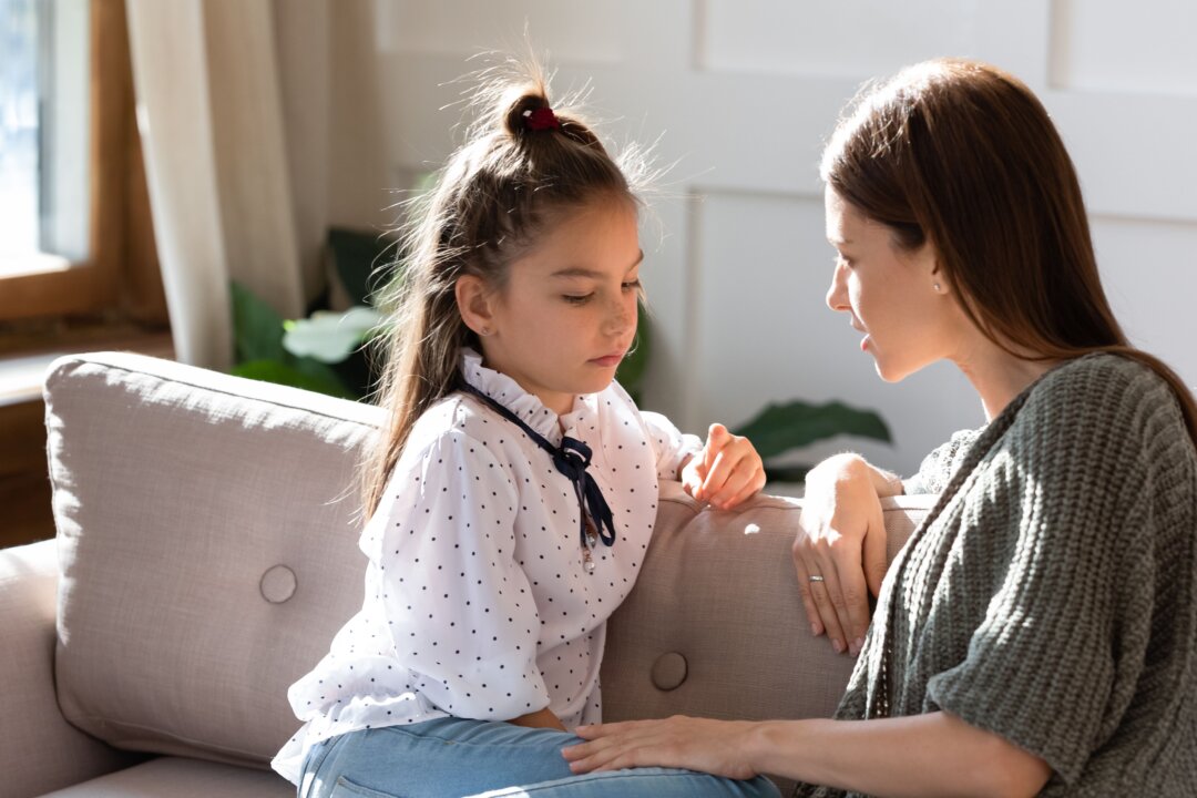 Helping reminder our children of times they have experienced compassion is an important step in teaching them to extend compassion to others. (fizkes/Shutterstock)