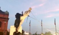 Columbus Statue Toppled, Thrown Into Harbor by Baltimore Rioters