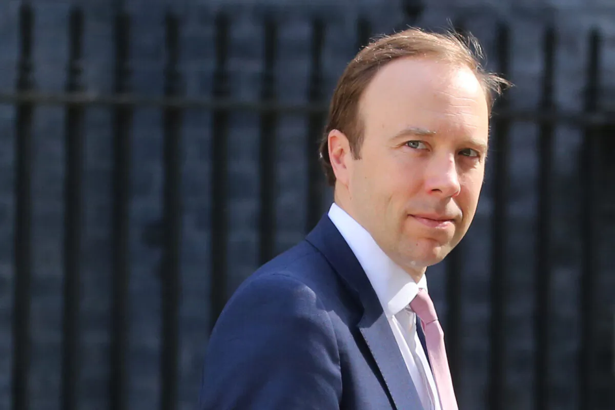 Britain's Health Secretary Matt Hancock leaves Downing street after the daily Covid-19 briefing in central London, on May 27, 2020. (Isabel Infantes/AFP via Getty Images)